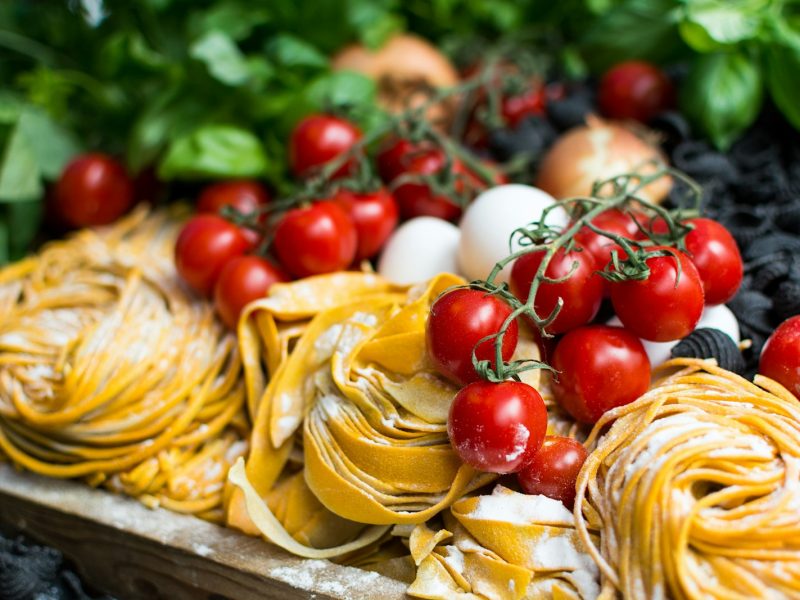 yellow pasta and cherry tomatoes
